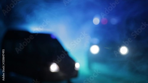 Corona virus concept with Ambulance car. Stay home for precautionary measures to prevent from corona virus. Ambulance car on dark misty background. Creative artwork decoration. Selective focus