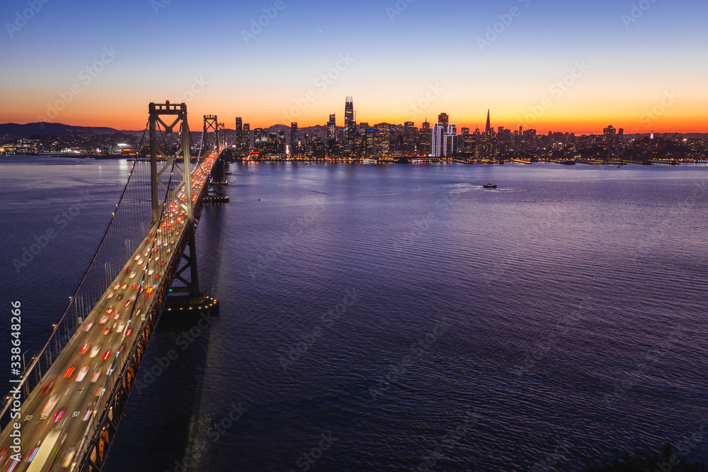 Golden Gate Bridge on a bright summer day in San Francisco. The photo was taken aerially from a drone. Golden Gate Bridge on a bright summer day in San Francisco. The photo was taken aerially from a drone.