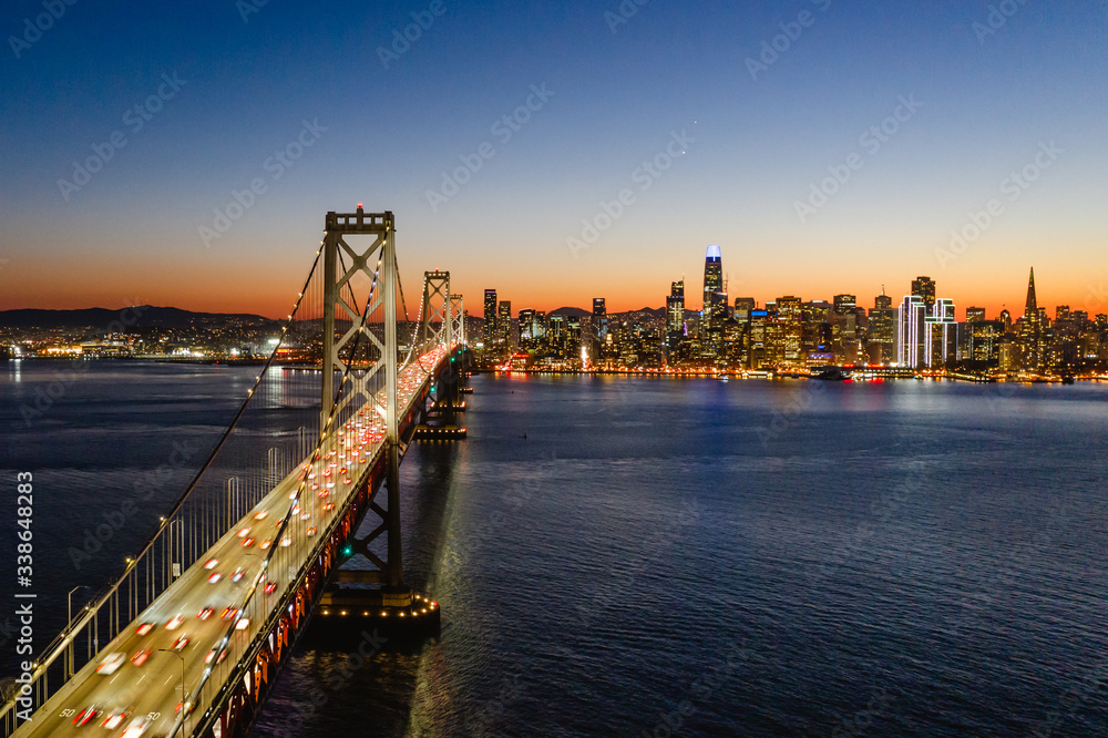 Fototapeta premium Golden Gate Bridge on a bright summer day in San Francisco. The photo was taken aerially from a drone.