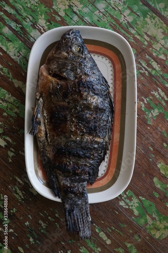 Freshly grilled Tilapia. Fresh from Lake Sebu, South Cotabato, Philippines. Selective Focus. photo