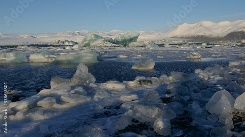 Wallpaper Mural Global warming climate change iceberg floe broken from glacier melting in water Torontodigital.ca