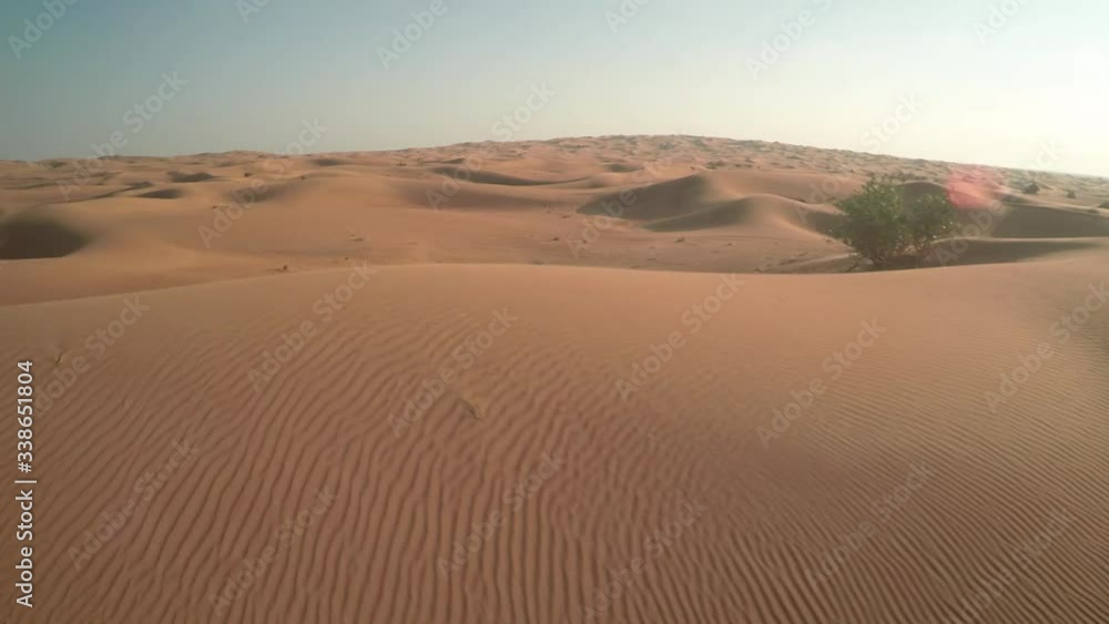 Abu Dhabi desert sand wave with sunset Abu Dhabi desert sand wave with sunset