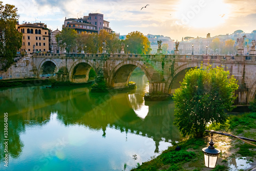 Rome, Italy. Ponte Sant'Angelo (Bridge of Angels) a Roman pedestrian bridge in Vatican City spanning Tiber River. Originally it was known as Pons Aelius (Aelian Bridge) or Bridge of Hadrian. photo