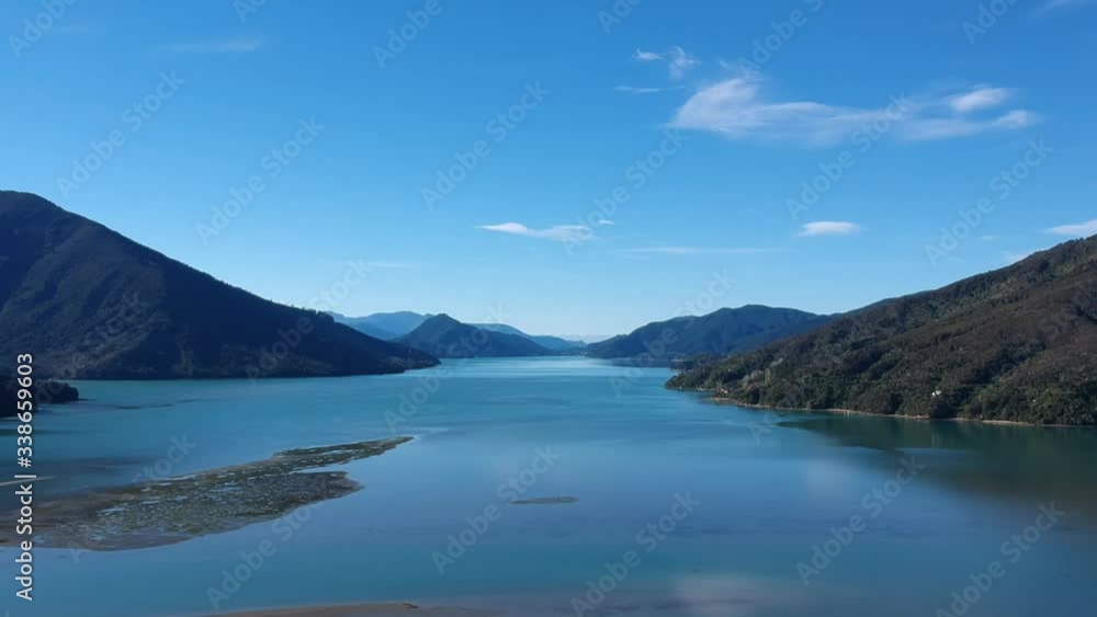 Pelorus Sounds at the top of the South Island of New Zealand on a crisp winter day. Shot with a drone to show full landscape. Pelorus Sounds at the top of the South Island of New Zealand on a crisp winter day. Shot with a drone to show full landscape.