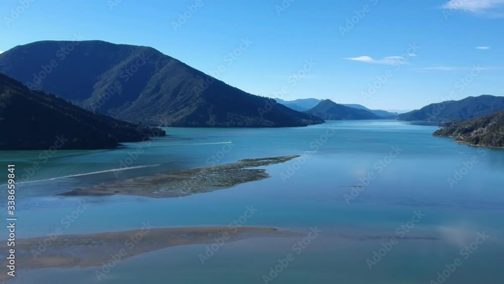 Pelorus Sounds at the top of the South Island of New Zealand on a crisp winter day. Shot with a drone to show full landscape. Pelorus Sounds at the top of the South Island of New Zealand on a crisp winter day. Shot with a drone to show full landscape.
