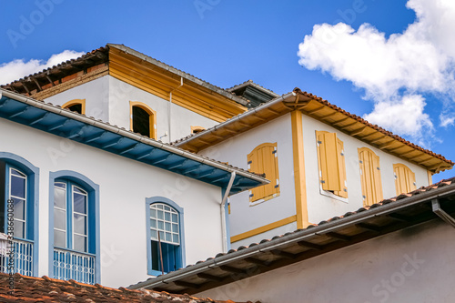 Close up of upper storeys of typical colonial buildings in the historical town of Serro, Minas Gerais Brazil
 photo