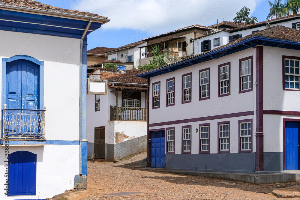 Typical cobblestone street with traditional houses in historic center of Diamantina, Minas Gerais, Brazil