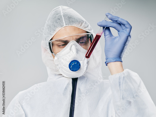 doctor with mask and syringe