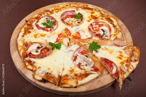 Pizza with cheese and mushrooms