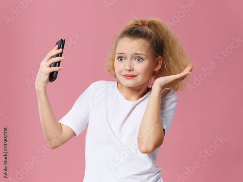 little girl with headphones listening music