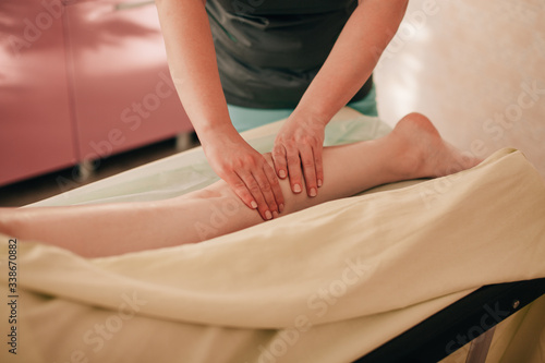massage room, massage table, therapeutic, wellness foot massage for girls
