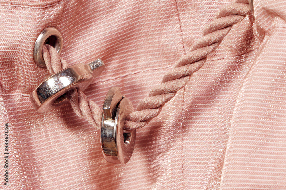 Naklejka premium Pink lace. Pink Synthetic fabric texture, background. Black fabric,textile accessories