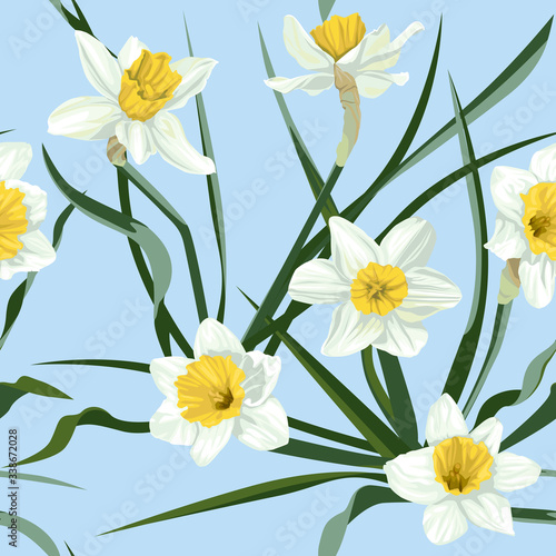 Seamless pattern with flowers of narcissus and green leaves.