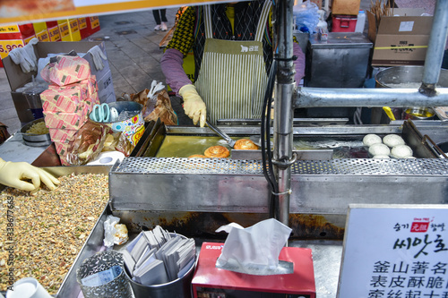 Busan city, South Korea - OCT 31, 2019: Korean street food, Seeds hotteok at BIFF Square in Busan. photo