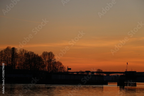 Sunset over train bridge dark orange © Dave