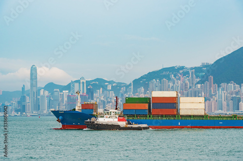 Photography Cargo ship in Victoria Harbor of Hong Kong city
