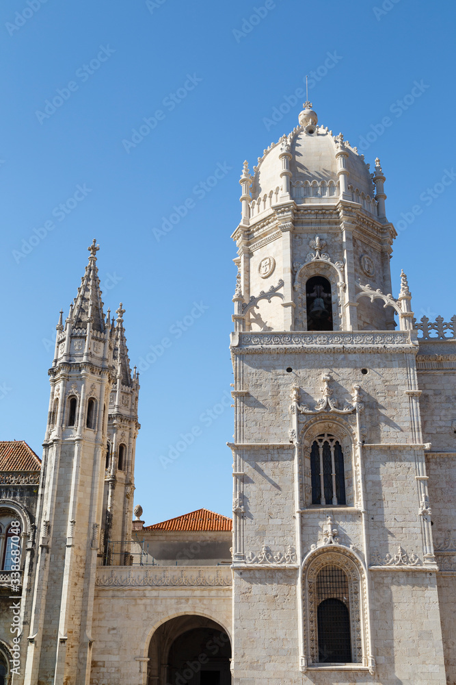 View of the historic Mosteiro dos Jeronimos (Jeronimos Monastery) in Belem, Lisbon, Portugal, on a sunny day.
