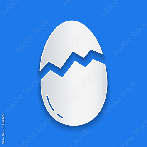 Paper cut Broken egg icon isolated on blue background. Happy Easter. Paper art style. Vector Illustration