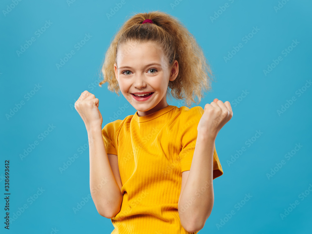 portrait of a little girl with hands up portrait of a little girl with hands up