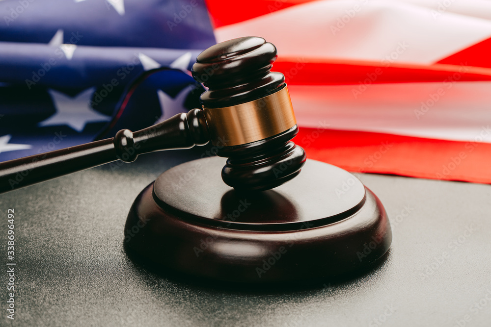 law gavel and USA america flag - American crime concept