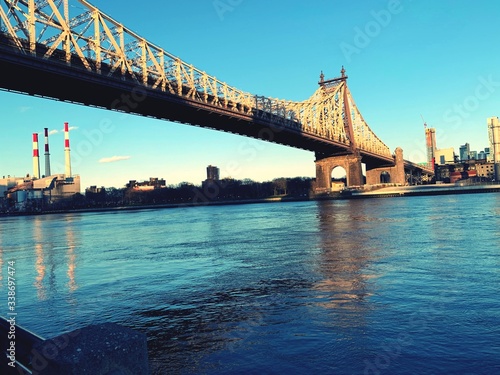 Fototapeta Naklejka Na Ścianę i Meble -  Queensboro Bridge over Newyork city East River at sunset viewed From midtown Manhattan - image