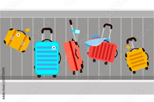 Suitcases on airport luggage conveyor belt. Travel bag. Summer time. Holidays. Vacation trip. Rest trip. Luggage band on the airport.