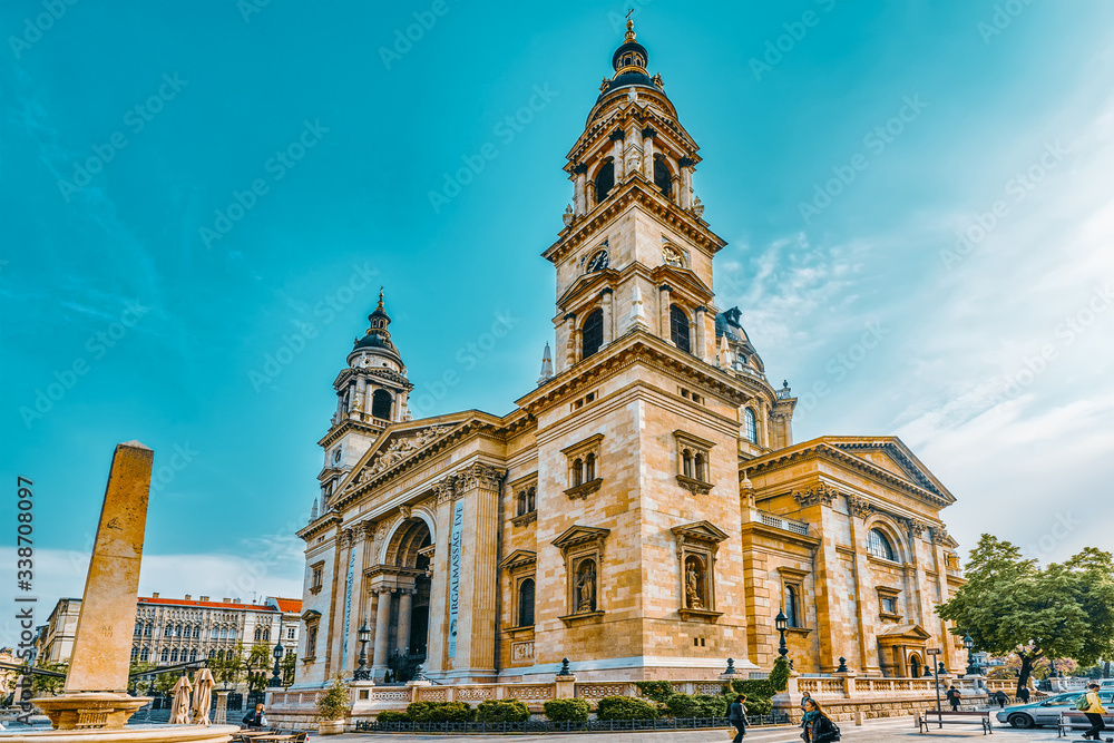 BUDAPEST, HUNGARY-MAY 04, 2016: St.Stephen Basilica in Budapest at daytime. Side View from street with car's and people. Hungary.