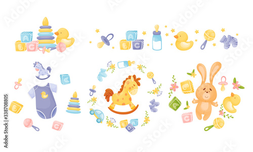 Fototapeta Naklejka Na Ścianę i Meble -  Baby Attributes and Toys with Rattles and Cubes Vector Set