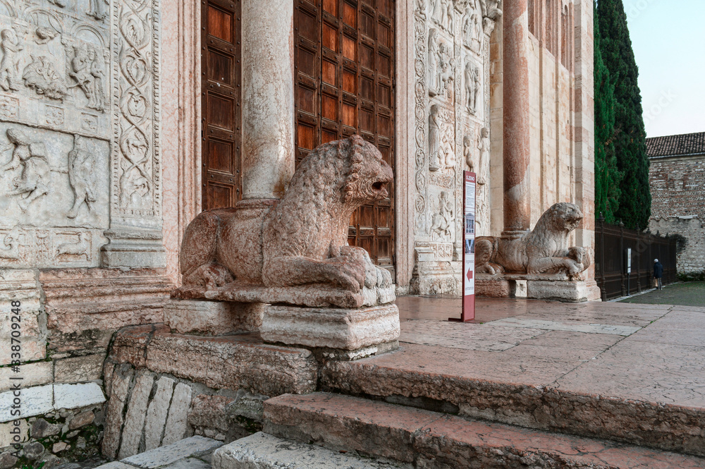 Stone lions supporting columns of the portico of the church of St. Zeno in Verona.