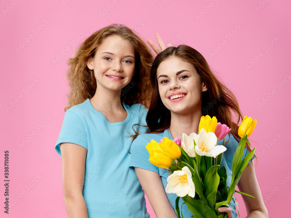 mother and daughter with tulips mother and daughter with tulips