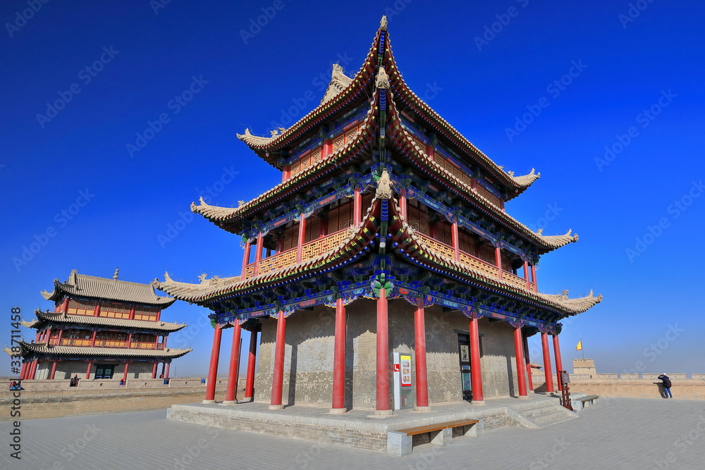 Gable hip roofs-watchtowers over Conciliation and Sighs Gates-Jiayu Pass-Jiayuguan city-Gansu-China-0786 Gable hip roofs-watchtowers over Conciliation and Sighs Gates-Jiayu Pass-Jiayuguan city-Gansu-China-0786