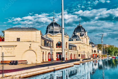 Boat dock near Vajdahunyad Castle (Hungarian-Vajdahunyad vara) with lake reflection. Budapest, Hungary photo