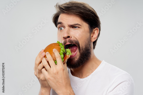 young man eating an apple