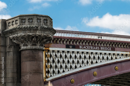 Detail of Blackfriars Bridge over the River Thames in London photo