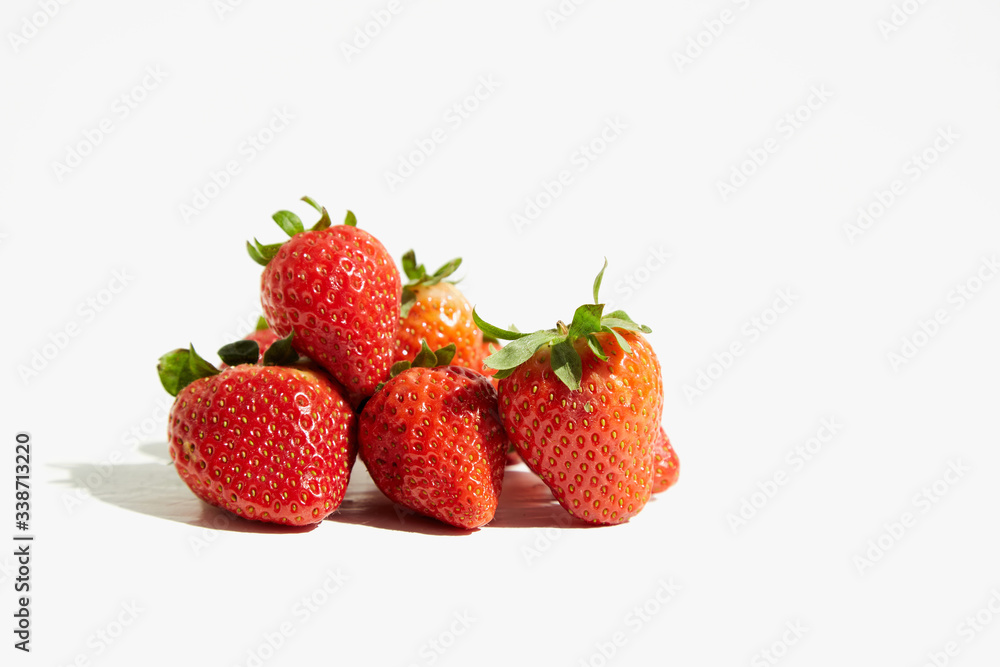 Beautiful berries of red ripe strawberry isolated on white.
Beautiful berries of red ripe strawberry isolated on white.