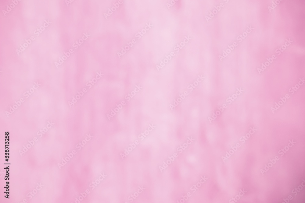 Fototapeta premium Blurred focus of sweet pink wooden wall for background and decoration. Cool banner on page and cover