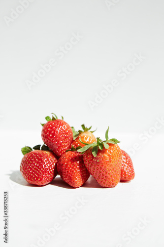 Ripe sweet tasty strawberry berries isolated on white.