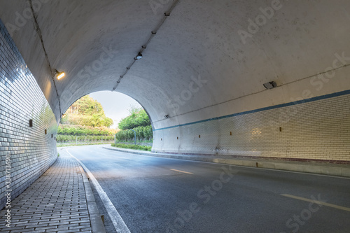 tunnel closeup, road background © chungking
