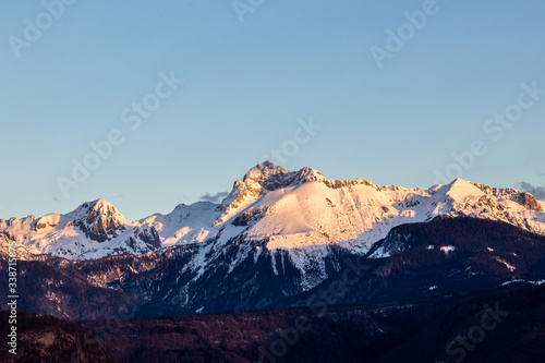 Triglav mountain range covered in morning light