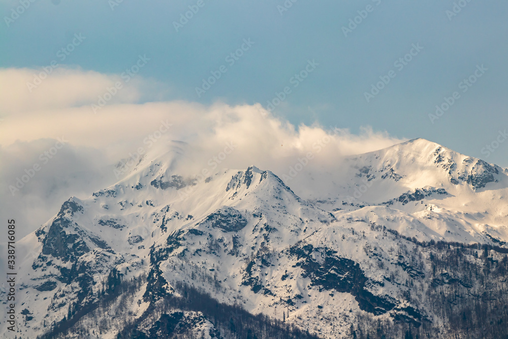 South Bohinj mountain range, covered in mist, Slovenia South Bohinj mountain range, covered in mist, Slovenia