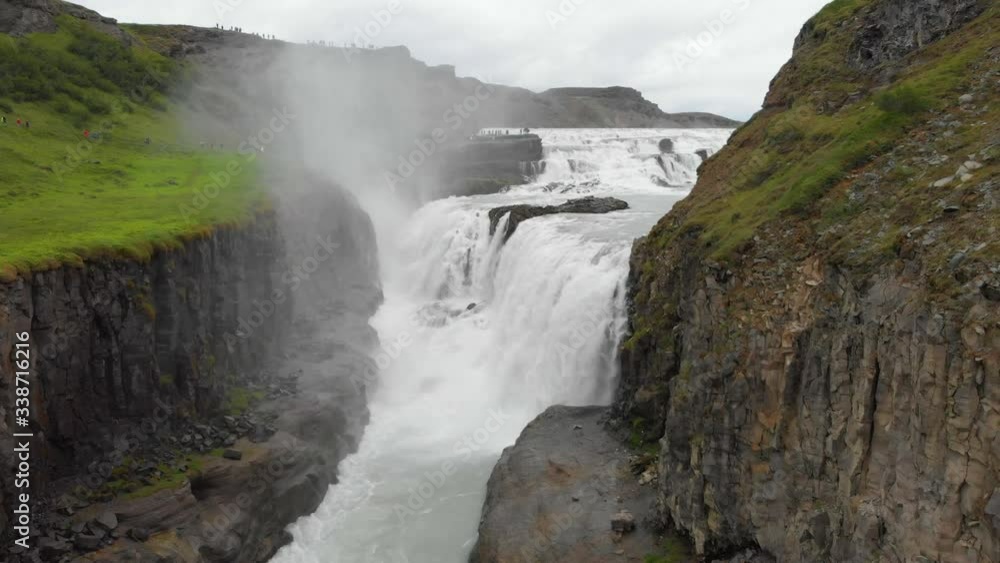Aerial view flying through the beautiful Gulfoss Falls in Iceland. Drone in 4K. Aerial view flying through the beautiful Gulfoss Falls in Iceland. Drone in 4K.