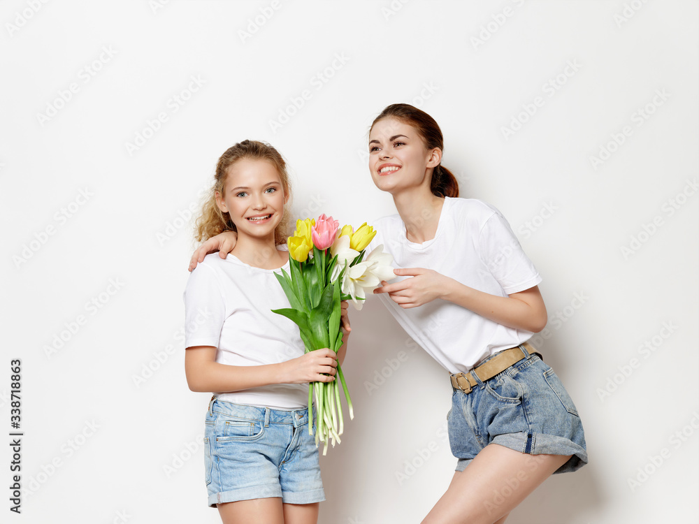 mother and daughter with flowers mother and daughter with flowers