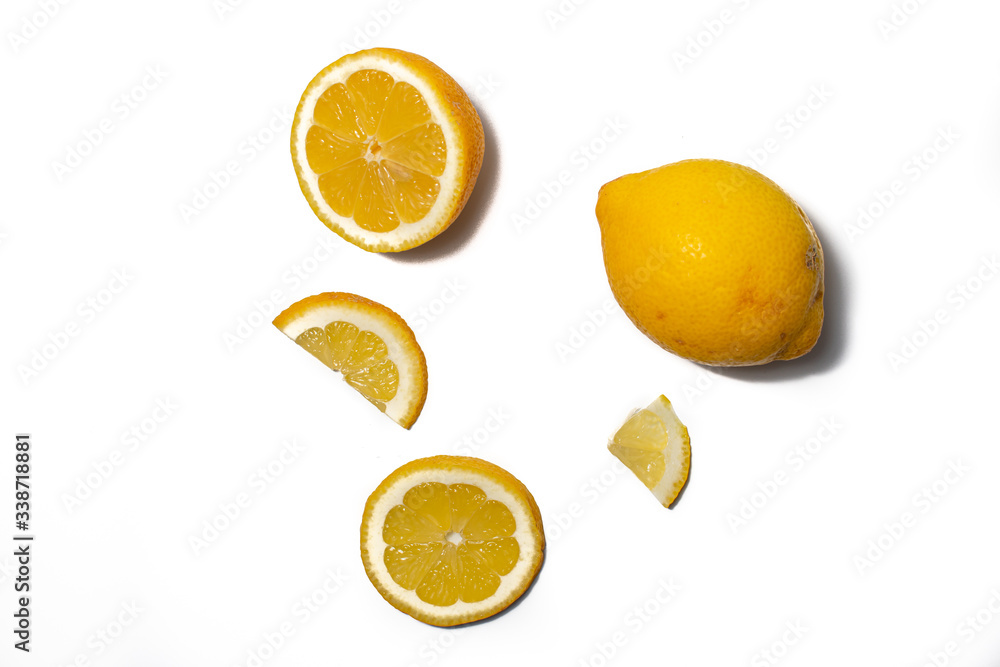 Lemons on white background. Pieces of lemons and whole lemons, with little shadow. Groups of yellow lemons on white Lemons on white background. Pieces of lemons and whole lemons, with little shadow. Groups of yellow lemons on white