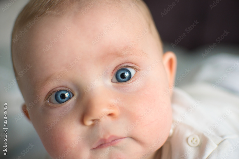 Cute baby boy face, baby with blue eyes Cute baby boy face, baby with blue eyes