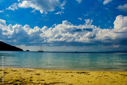 boat on the sea, view from the Koukounaries beach in Skiathos 