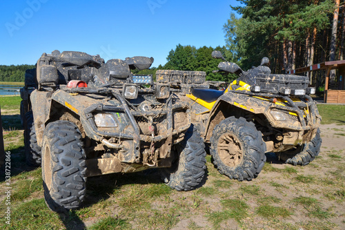 A dirty ATV quad bike after driving on mud