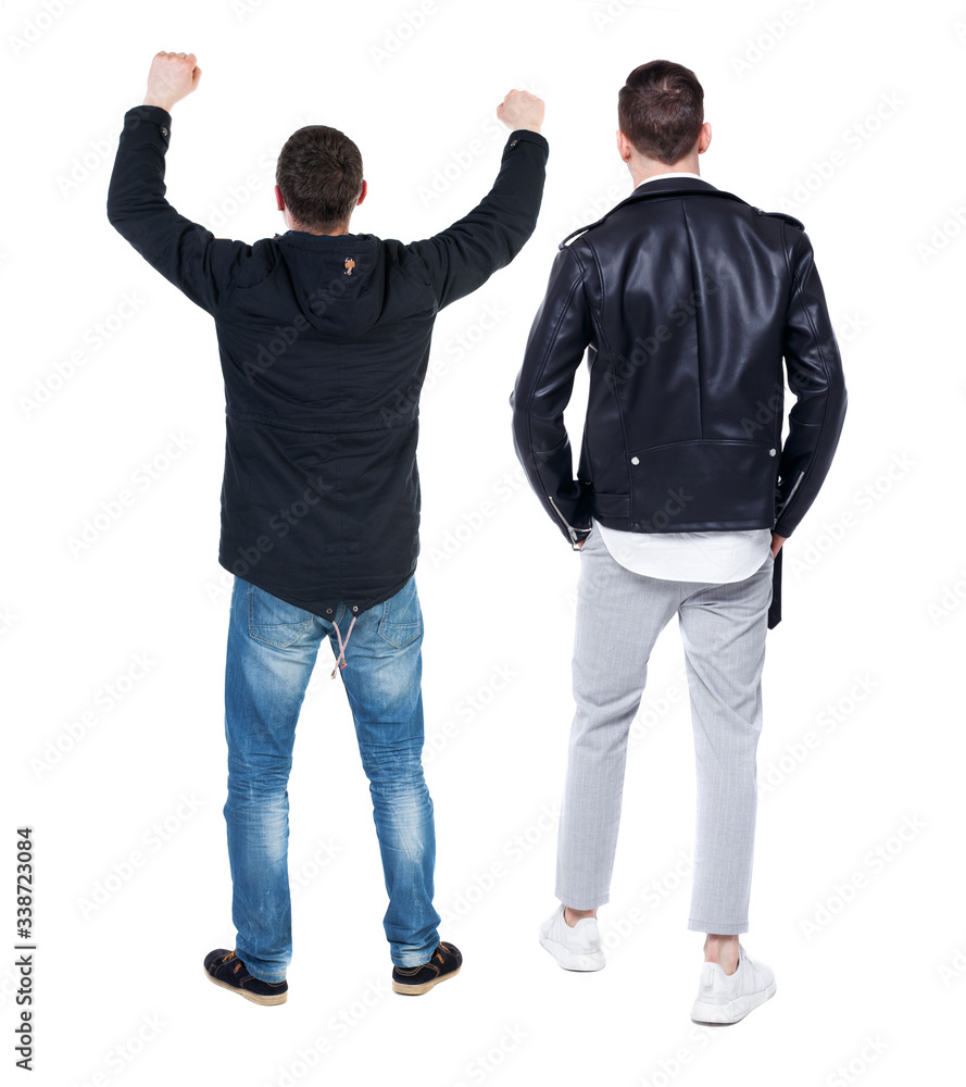 Back view of couple in winter jacket. Back view of couple in winter jacket.