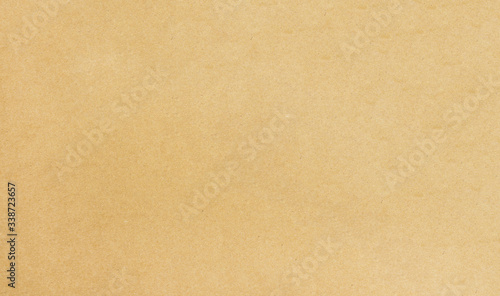 Brown paper or cardboard texture background. © Bowonpat