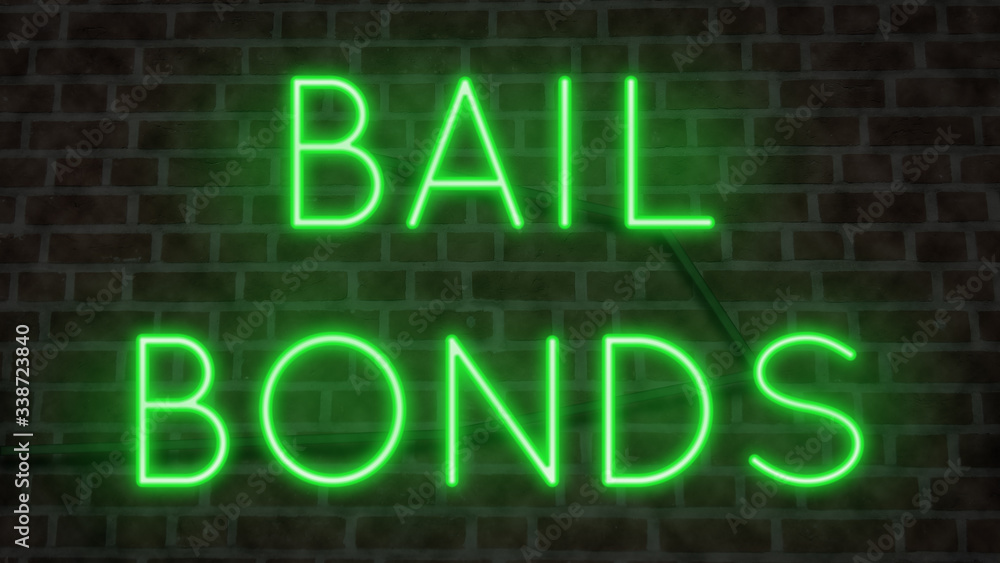 Neon BAIL BONDS sign on a brick wall at night Neon BAIL BONDS sign on a brick wall at night
