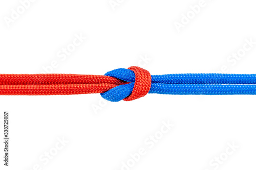 Knot on a cord isolated on a white background .